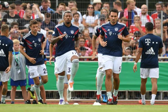Bayern Munich's trio Thomas Mueller, Jerome Boateng and Mats Hummels (facing from left to right) have been told by Germany's head coach Joachim Loew that they are no longer part of his plans on the international stage.