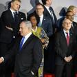 Israeli Prime Minister Benjamin Netanyahu greets participants before a dinner at a conference in Warsaw on the Middle East