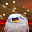 The German government is urging people to wear the Jewish kippa in a demonstration of solidarity as Jews face a spike in anti-Semitism
