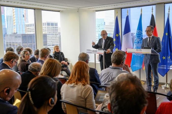 France's Foreign Minister Jean-Yves Le Drian (L) and Germany's Foreign Minister Heiko Maas speak to reporters at the French Mission to the United Nations in New York on April 2, 2019