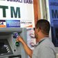 Man withdrawing money from the ATM