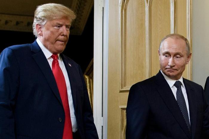 The US has said a new Russian medium-range missile system breaches the INF Treaty and President Donald Trump (L, pictured September 2018) said the country was suspending its obligations under the treaty -- a move mirrored shortly after by Moscow