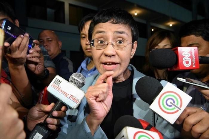 Philippine journalist Maria Ressa managed to speak to reporters at the National Bureau of Investigation after her arrest in Manila Wednesday