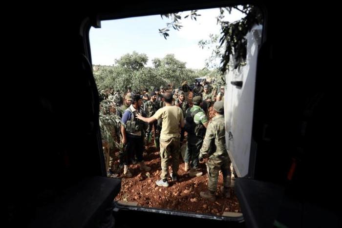 Jihadist-led fighters have launched a counterattack against Syrian government forces advancing on their stronghold in the Idlib region in the northwest, triggering heavy fighting in which more than 50 combatants have been killed