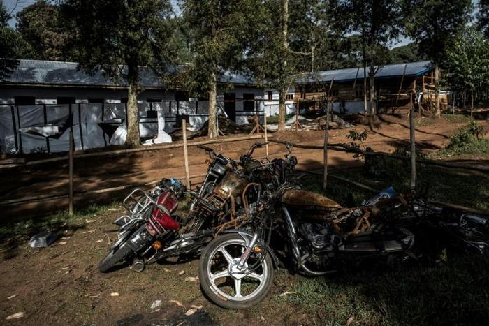 Motorbikes burnt during an attack outside an Ebola treatment centre in Butembo, the epicentre of the latest outbreak