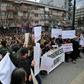 Angry protestors in the Kosovo capital Pristina demand justice for a teenager who said she was raped by her teacher and then a police officer