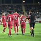 Qatari players celebrate a goal during the 2019 AFC Asian Cup Round of 16 against Iraq at the Al Nahyan Stadium in Abu Dhabi on January 22, 2019