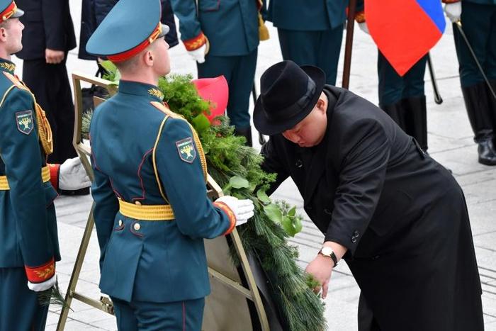 North Korean leader Kim Jong Un lays a wreath at a World War II memorial to Russia's Pacific Fleet