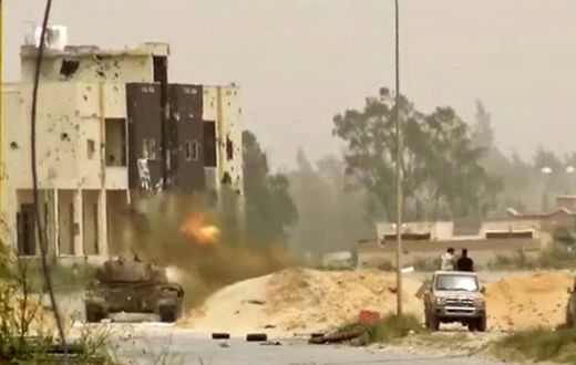 A tank in clashes on the outskirts of the Libyan capital Tripoli