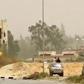A tank in clashes on the outskirts of the Libyan capital Tripoli