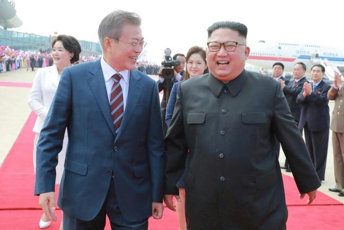 UN sanctions monitors are investigating North Korea's use of luxury vehicles such as Lexus SUVs at the inter-Korean summit between South Korean President Moon Jae-in (L) and Kim Jong Un in September