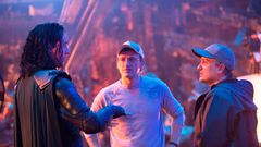 The Russo Brothers (Joe and Anthony Russo) alongside Tom Hiddleston on the set of Avengers: Infinity War.