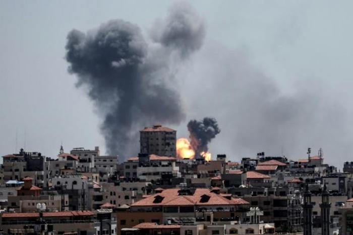 Smoke billows over Gaza City after Israel carries out an air strike in response to a barrage of rockets fired by Palestinian militants