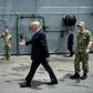 US media reported efforts were made to obscure the USS John S. McCain's name during President Donald Trump's visit to the Yokosuka Naval Base in Japan