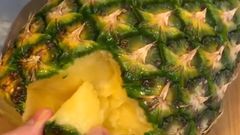Eating pineapple
