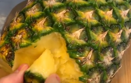 Eating pineapple