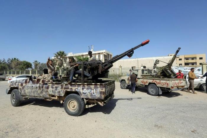 Forces loyal to Libya's unity government take up positions south of Tripoli to block an advance by fighters from Khalifa Haftar's self-styled Libyan National Army