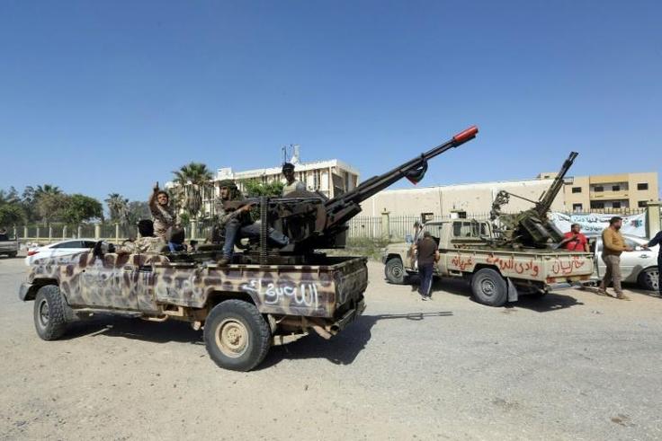 Forces loyal to Libya's unity government take up positions south of Tripoli to block an advance by fighters from Khalifa Haftar's self-styled Libyan National Army