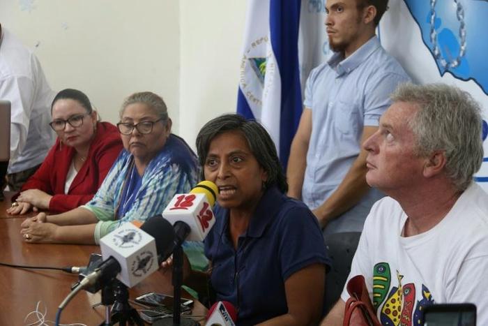 Frederic Coppens (right) and his wife Tamara Zamora (second right) fear for their daughter Amaya who has been on hunger strike for a week