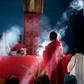 Father Celso Taibo burns incense during a palm Sunday mass in Buzi