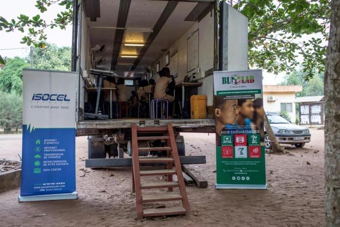 Few students in Ivory Coast have ever seen, let alone touched, a computer