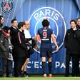 Edinson Cavani heads to the dressing room after injuring himself in PSG's game against Bordeaux