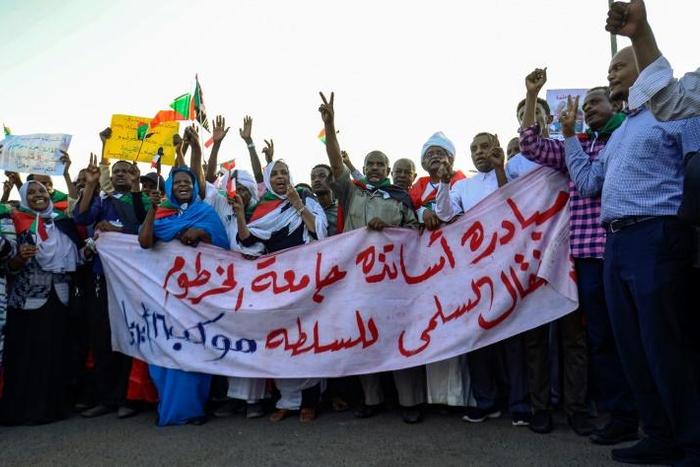 Demonstrators outside of Sudan's army headquarters call for a quick turn to civilian rule