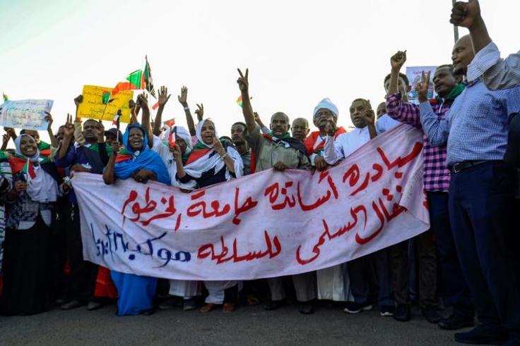 Demonstrators outside of Sudan's army headquarters call for a quick turn to civilian rule
