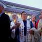 People hold a candlelight vigil for victims of the attack on a synagogue in California