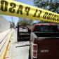 Police guard the site where forensic investigators have exhumed bodies from a mass grave in a farm in Zapopan, in Mexico's Jalisco state