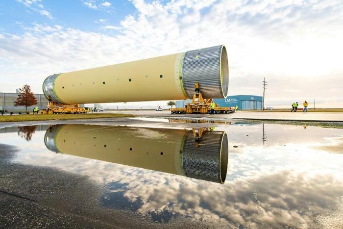 In this photo obtained from NASA, technicians at NASA’s Michoud Assembly Facility in New Orleans, move the largest piece of structural test hardware for the new deep space rocket, the Space Launch System