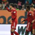 David Alaba (L) celebrates with Leon Goretzka (C) after the Austrian defender scored the winning goal