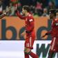 David Alaba (L) celebrates with Leon Goretzka (C) after the Austrian defender scored the winning goal