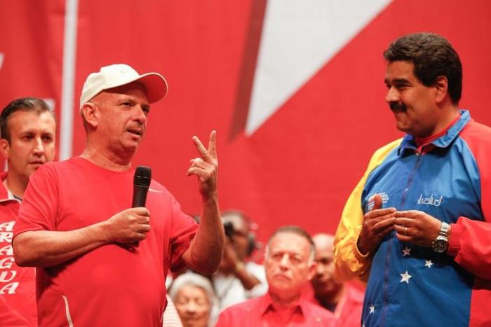 Hugo Carvajal (left), pictured with President Hugo Chavez in 2014, made headlines recently by voicing support for Venezuelan opposition leader Juan Guaido