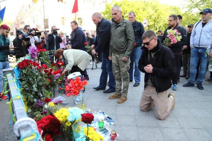 Thousands of mourners flocked to the trade union building to lay flowers and light candles in memory of the victims