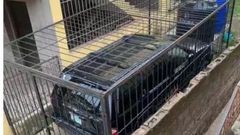 Man creates cage for his new car, locks it with padlock to save it from being stolen