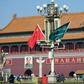 The national flags of Saudi Arabia and China are displayed on a lampost in Tiananmen square in Beijing ahead of Crown Prince Mohammed bin Salman's visit