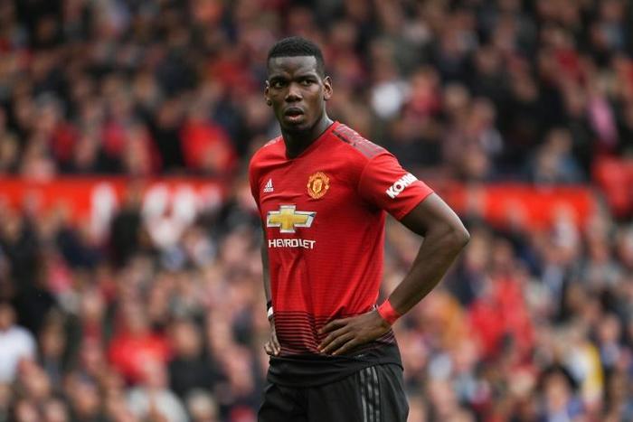 Real Madrid head coach Zinedine Zidane has played down reports linking Manchester United's French midfielder Paul Pogba with a move to the Spanish club