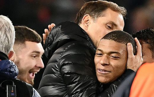 Paris Saint-Germain coach Thomas Tuchel embraces Kylian Mbappe after the French side's 2-0 win over Manchester United