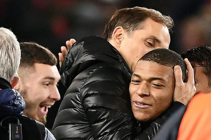 Paris Saint-Germain coach Thomas Tuchel embraces Kylian Mbappe after the French side's 2-0 win over Manchester United