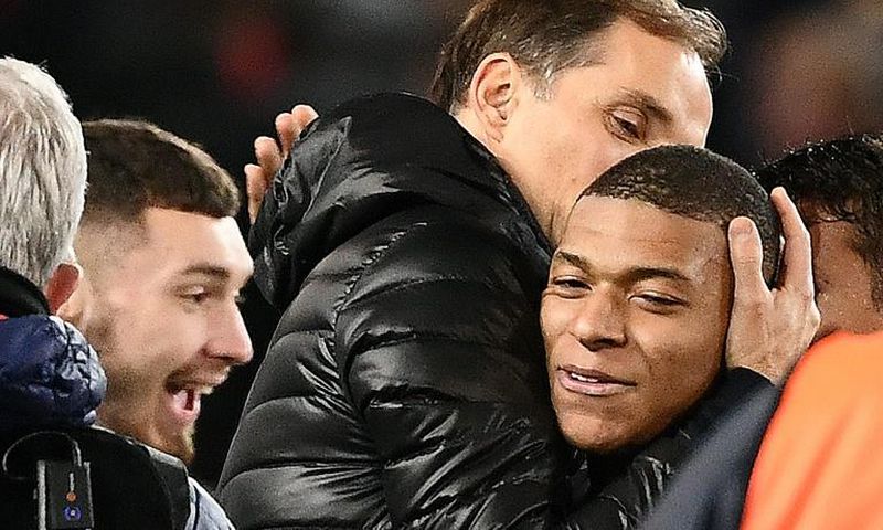 Paris Saint-Germain coach Thomas Tuchel embraces Kylian Mbappe after the French side's 2-0 win over Manchester United