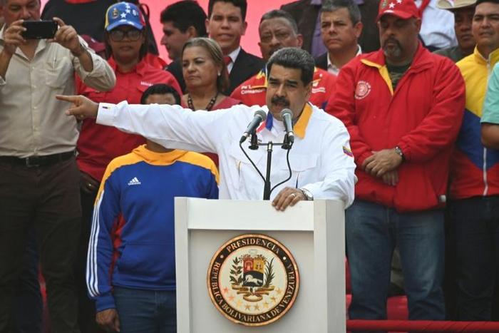 Venezuela's President Nicolas Maduro speaks during a rally in front of Miraflores Presidential Palace in Caracas on May 20, 2019. Embattled Venezuelan President Nicolas Maduro rallied hundreds of his supporters in Caracas on Monday to mark the annivers...
