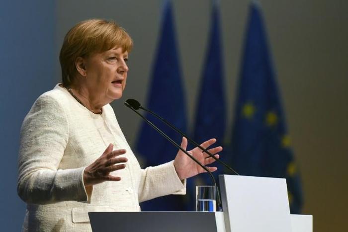 German Chancellor Angela Merkel's ruling coalition will hold crisis talks after a thumping at the European elections