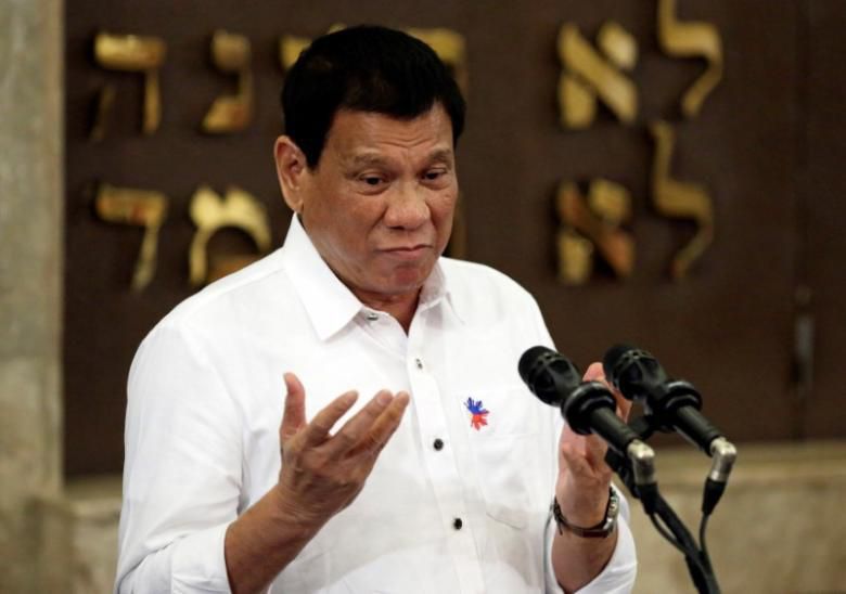 Philippine President Rodrigo Duterte gestures during his speech at the Beit Yaacov Synagogue, The Jewish Association of the Philippines in Makati city, metro Manila, Philippines October 4, 2016.