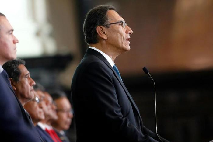 Peruvian President Martin Vizcarra has survived a vote of confidence in the country's opposition-controlled Congress