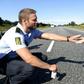 A Danish policeman plays with a migrant girl on the Danish-German border. With the exception of the far left, all of Denmark's political parties are now in agreement on keeping immigration at its current low