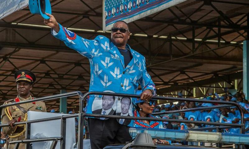 Mutharika salutes the crowd at the launch of his party manifesto in April