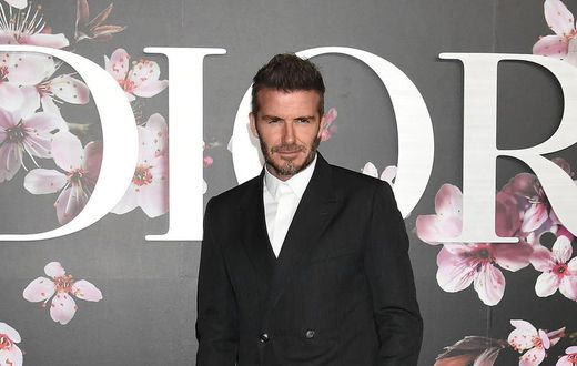Here’s How Guys Should Wear a Suit With Sneakers