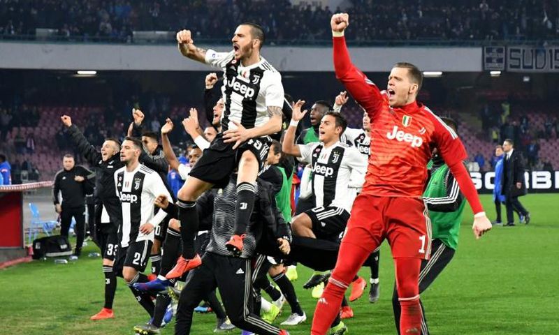 Juventus all-but-sealed their eighth straight Serie A title after winning 2-1 at Napoli to go 16 points clear at the top