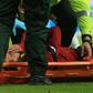 Liverpool manager Jurgen Klopp will have a nervous wait to see whether leading scorer Mohamed Salah suffered concussion in the 3-2 win over Newcastle which kept their title hopes alive